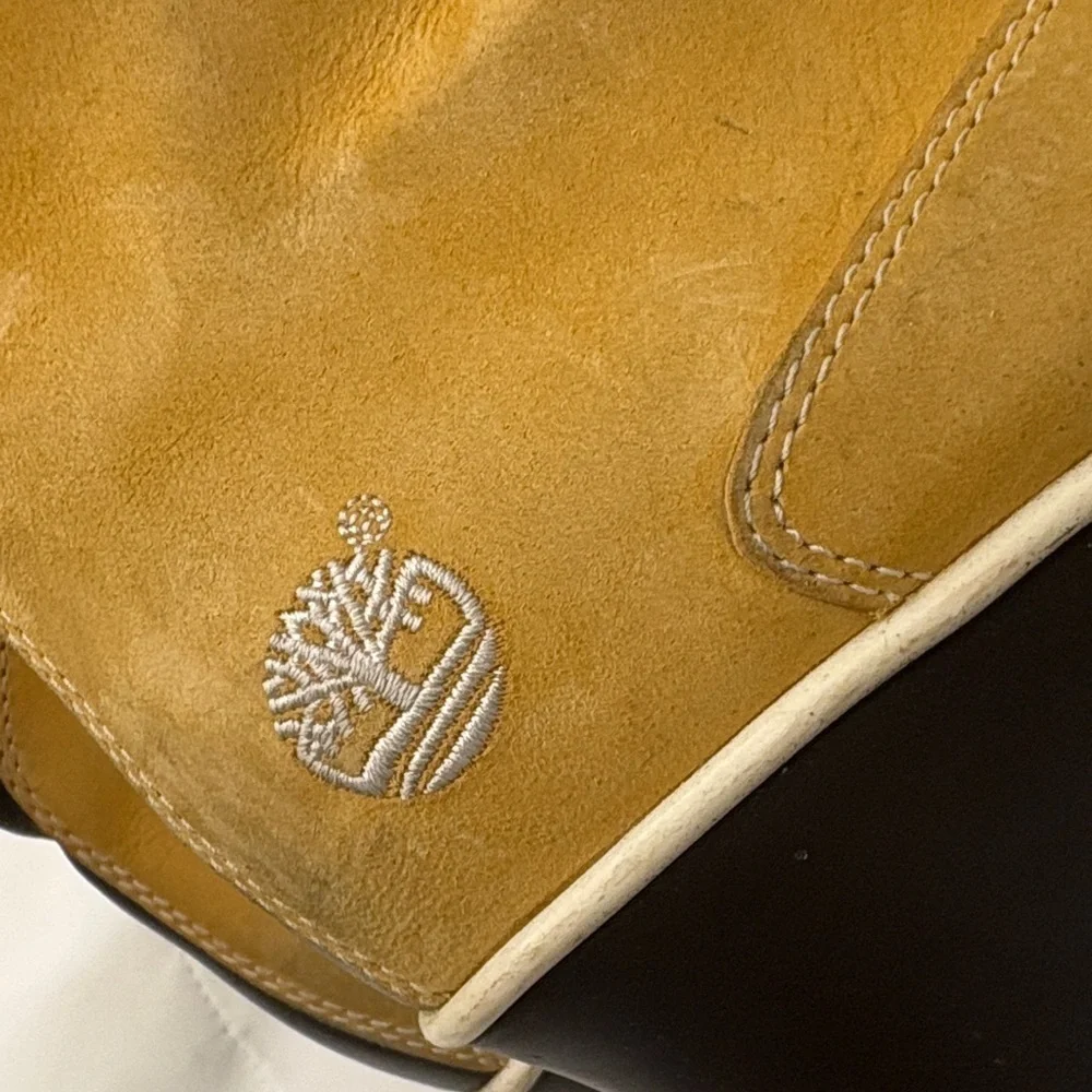 TIMBERLAND SQUARE TOE LACE UP WEDGE ANKLE BOOTS.